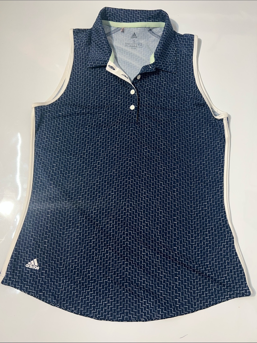 adidas Navy Sleeveless Polo with White Trim and Subtle Pattern